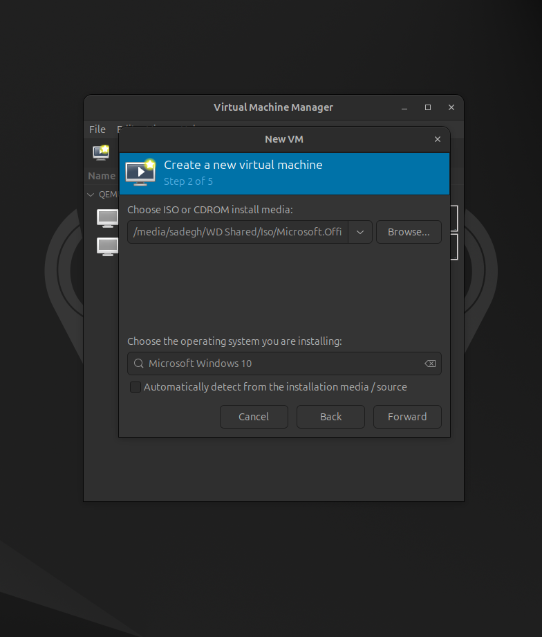 The second step of the virtual machine creation wizard in Virtual Machine Manager, where the Windows 10 ISO file is selected as the installation media.