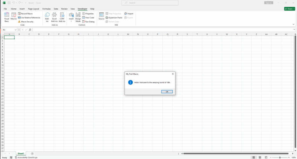 Message box showing "Welcome to the amazing world of VBA"